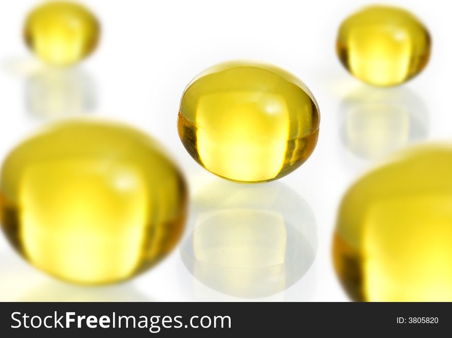 Close-up of  pills on a white background