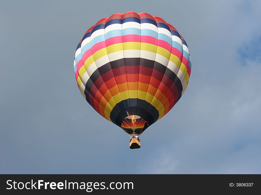 Looking up into a hot air balloon with the flame ignited