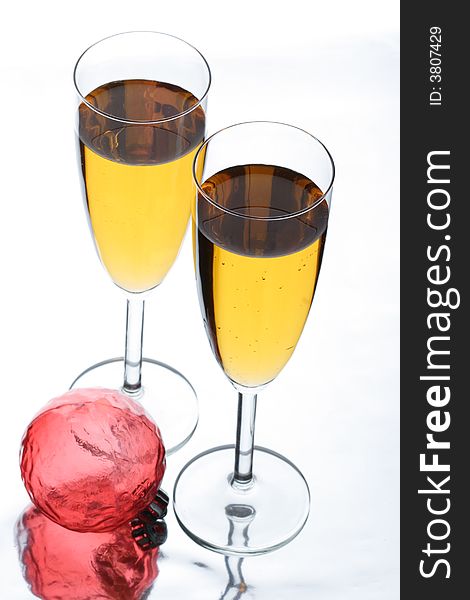 Two glasses in which champagne is poured. Two glasses in which champagne is poured