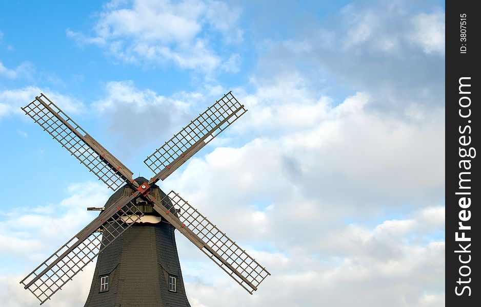 Old windmill against blue sky from Lower Saxony