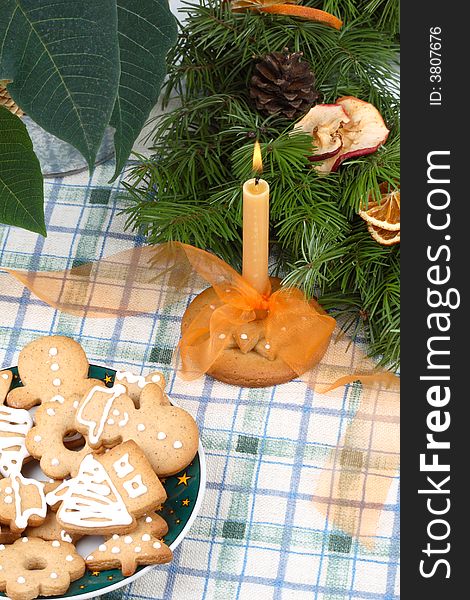 Advent wreath, gingerbread cookies, candlestick and candle. Advent wreath, gingerbread cookies, candlestick and candle