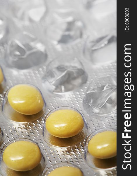 Yellow and round tablets