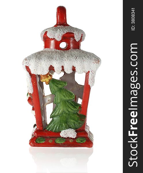 Christmas toy. A toy on a fur-tree with porcelain fir - three