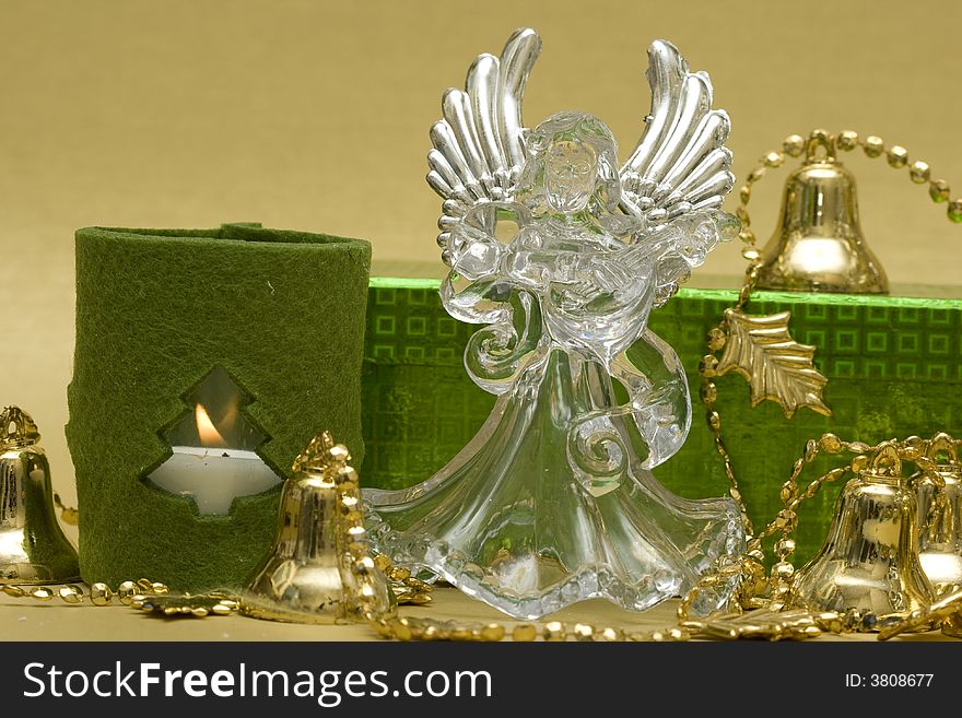 Angel with candle and gift box
