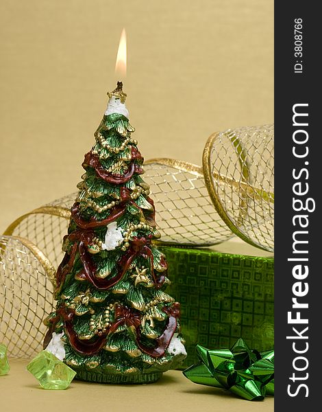 Festive new-year candle with Christmas tree