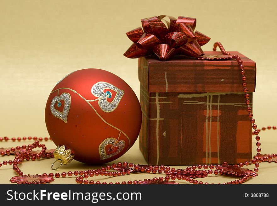 Beautiful red Christmas ball and gift box