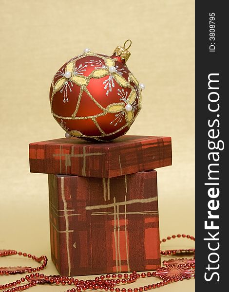 Beautiful red Christmas ball and gift box