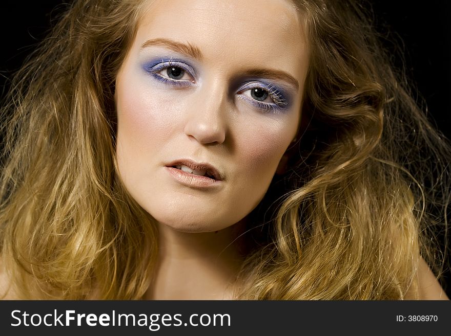 Beautiful blond with glamorous frosted makeup. Beautiful blond with glamorous frosted makeup