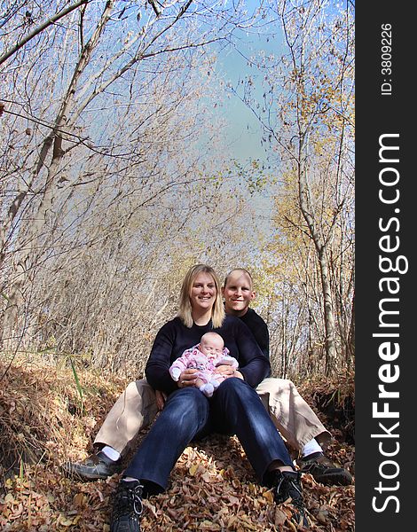 Happy young couple enjoying the outdoors in Autumn. Happy young couple enjoying the outdoors in Autumn.