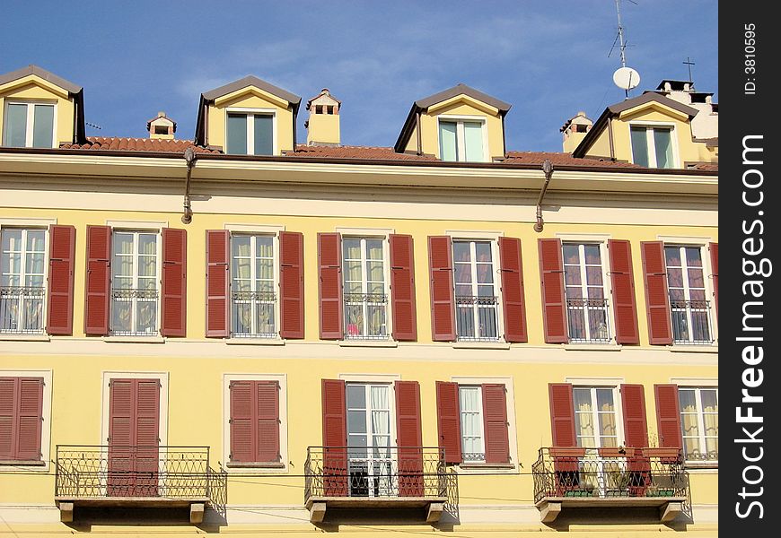 The front of a nice building on the river of the canal naviglio in Milan. The front of a nice building on the river of the canal naviglio in Milan