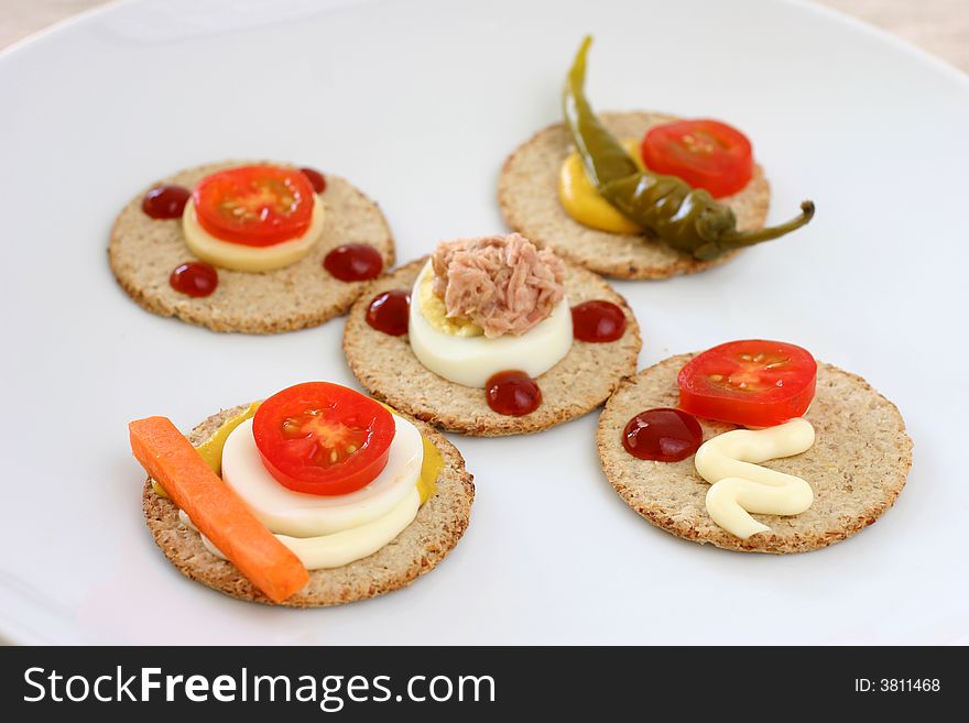 Healthy colorful platter with assorted vegetables on fancy white china. Healthy colorful platter with assorted vegetables on fancy white china