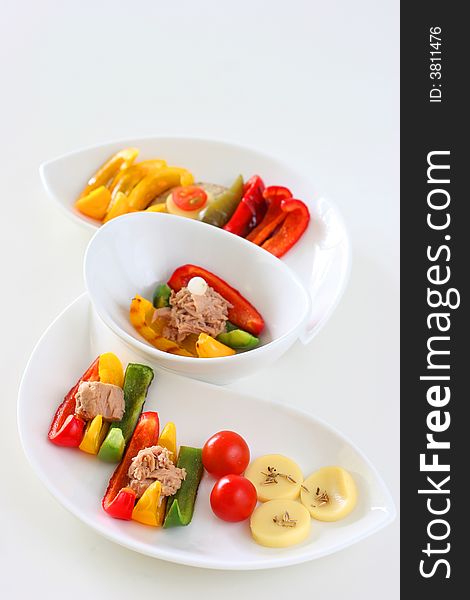 Healthy colorful platter with assorted vegetables on fancy white china. Healthy colorful platter with assorted vegetables on fancy white china