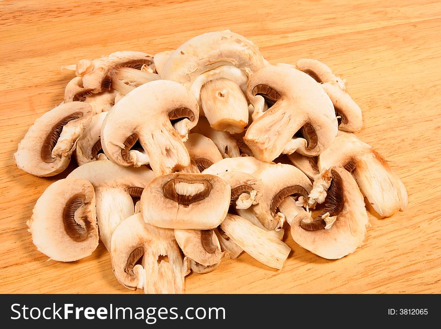 Cut mushrooms on chopping board