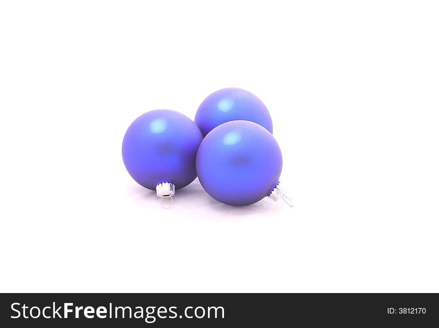 A three blue christmas balls isolated on white background.