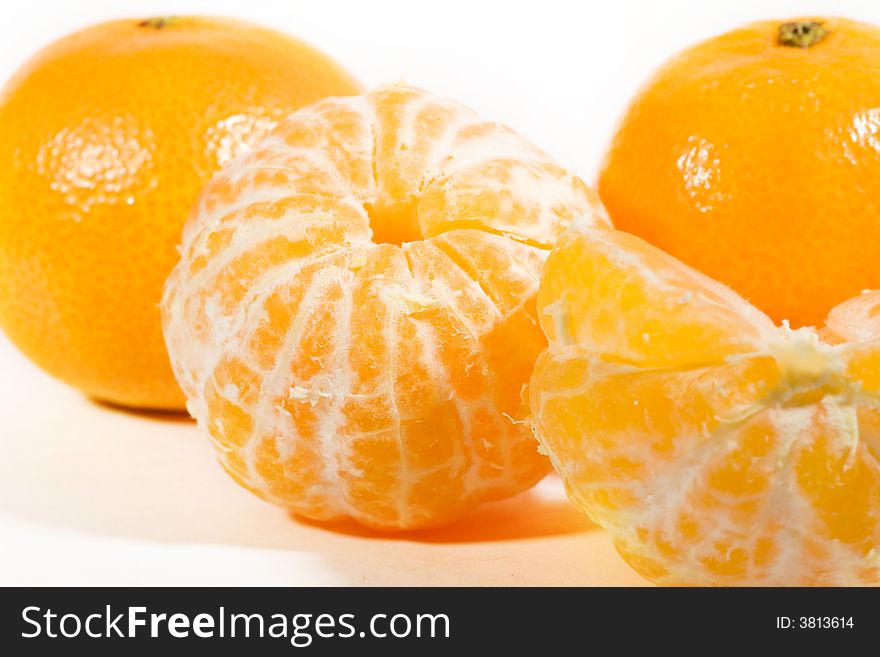 Whole and peeled Tangerines