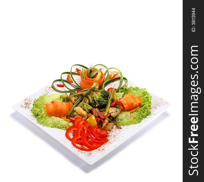 Gourmet vegetable dish on rectangular plate. Gourmet vegetable dish on rectangular plate