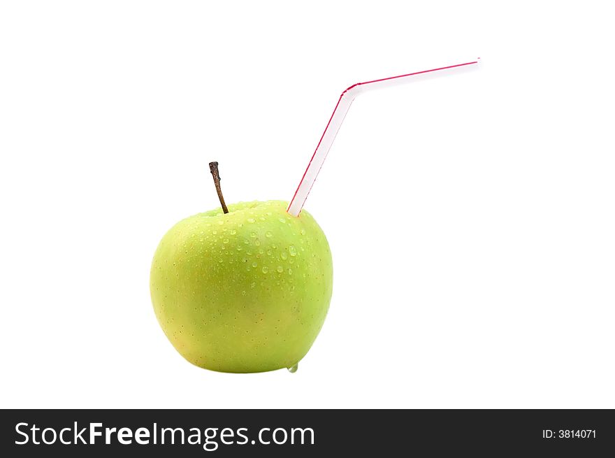 Green apple with drinking straw on white background. Green apple with drinking straw on white background