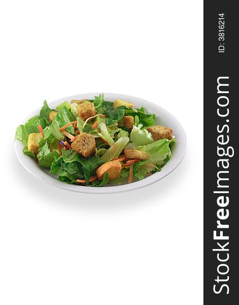 Generic salad on white plate isolated on white background.