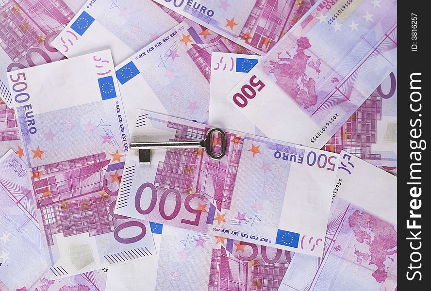 Euro banknotes background and key. Euro banknotes background and key