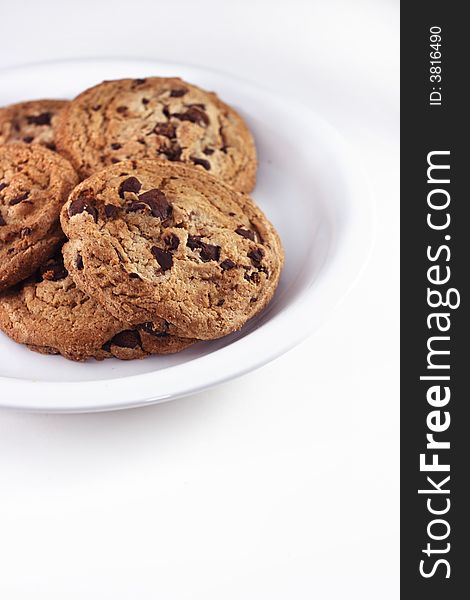 Picture of cookies on a white plate on a white background. Picture of cookies on a white plate on a white background.