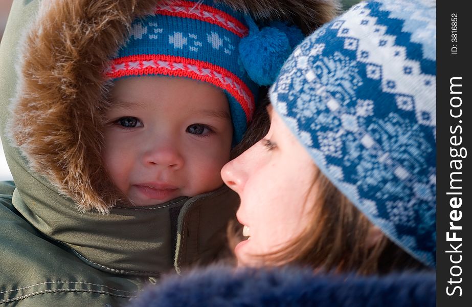 Mam and son walking in winter