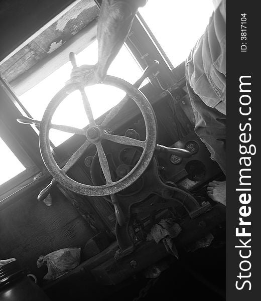 A steering wheel of a bumboat controlled by its captain