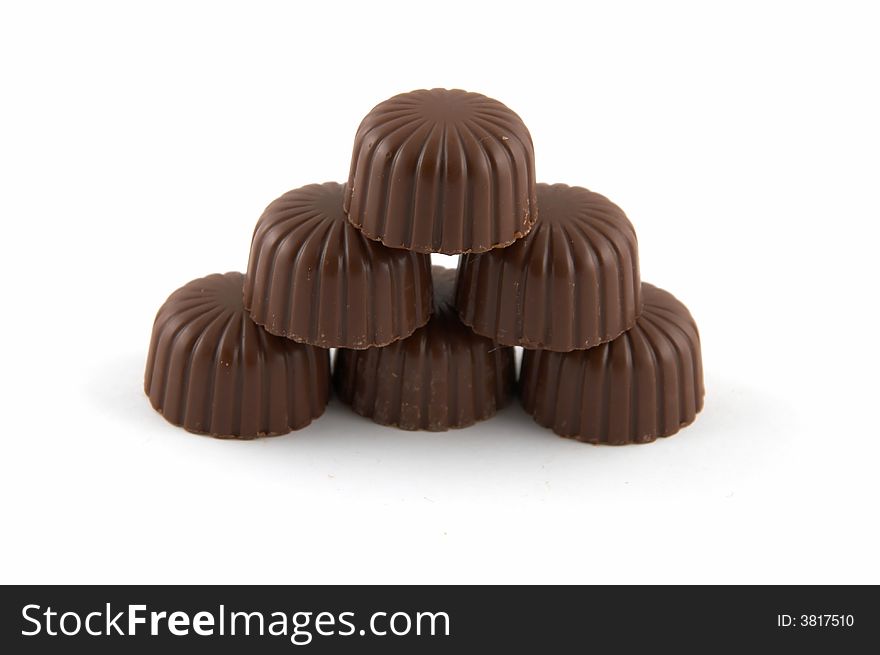 Sweets chocolate with a stuffing, on a white background