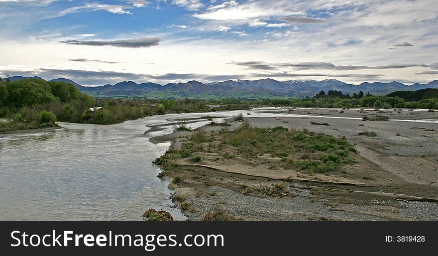 A river meandering down te Southern Alps in New Zealand. A river meandering down te Southern Alps in New Zealand