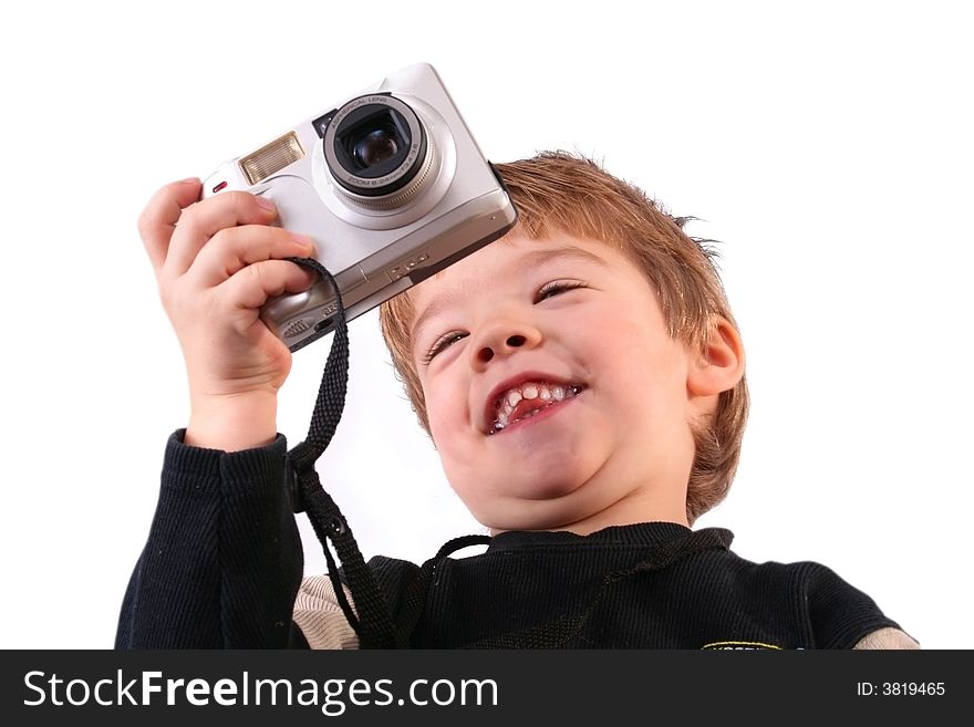 Young boy taking a photograph