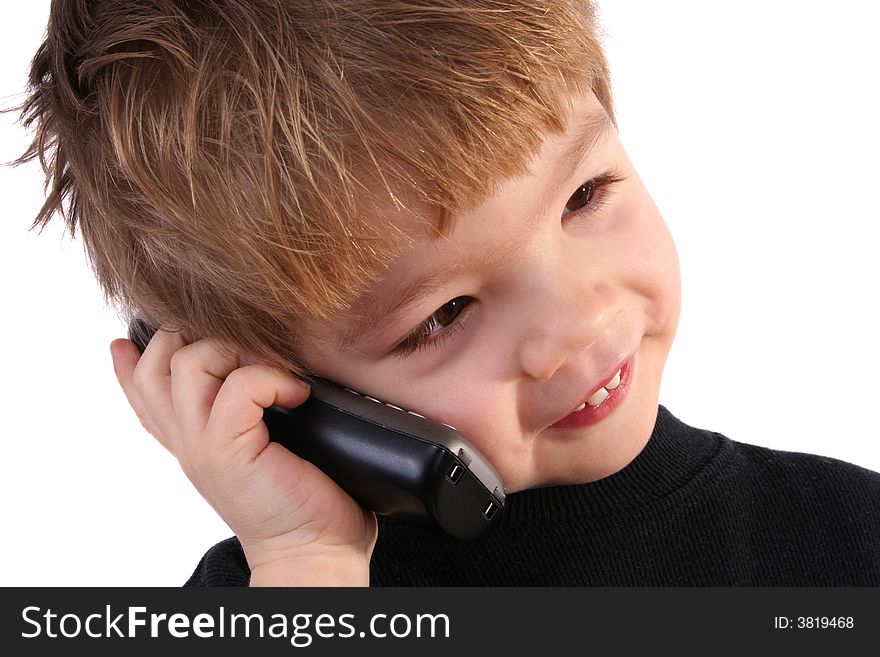 Little boy speaks by phone