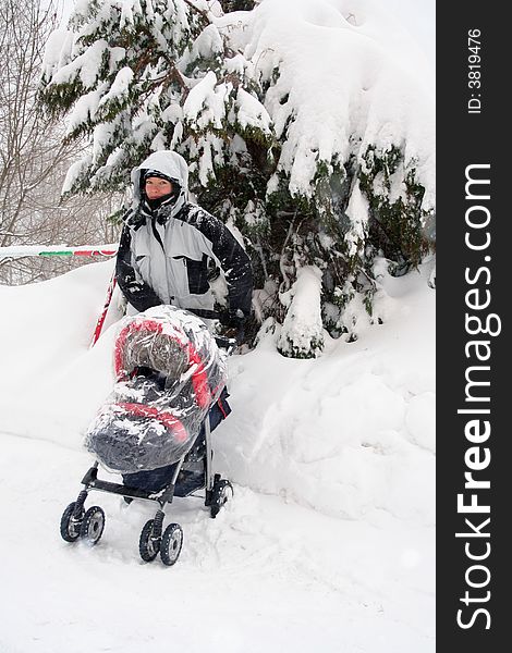 Mother with son in winter time