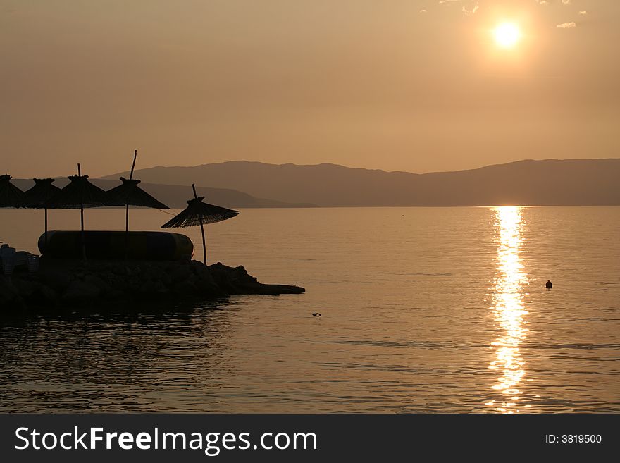 Mediterranean sunset with tropic atmosphere