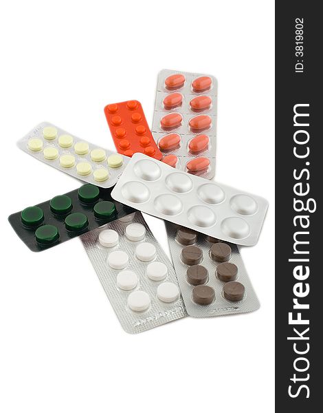 Set of pills blister packings isolated on white. Set of pills blister packings isolated on white