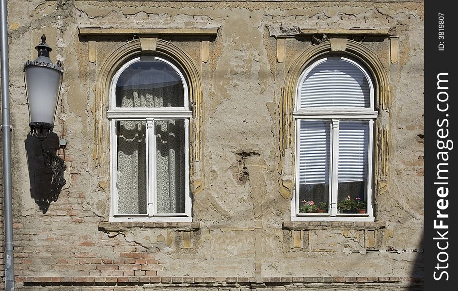 Two windows on old house