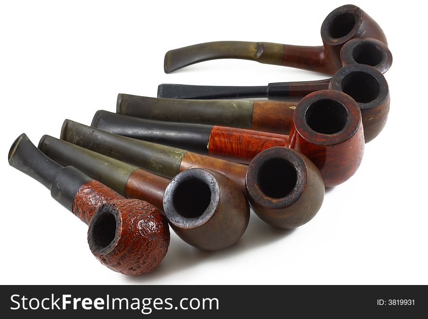 Set of tobacco pipes isolated on white