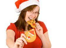 Santa Girl With Red Specs And Gingerbread Stock Image Santa Girl With Red Specs And Gingerbread Stock Image