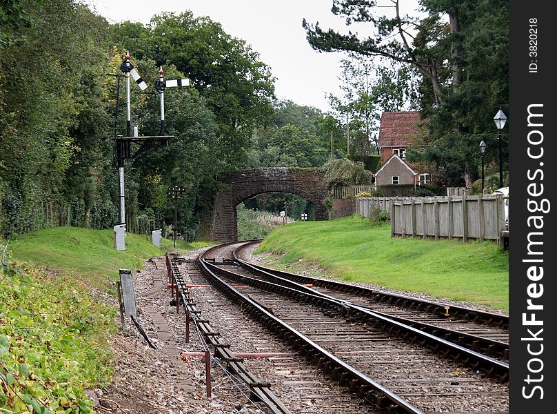 Railway Line Going Under A Bridge