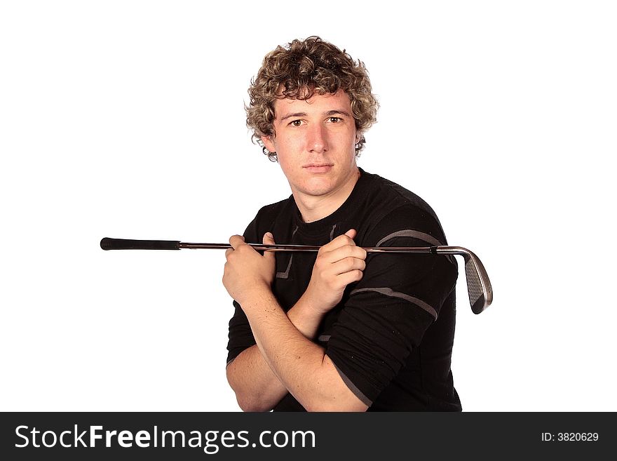 Golfer in practise mode with golf club in arms
