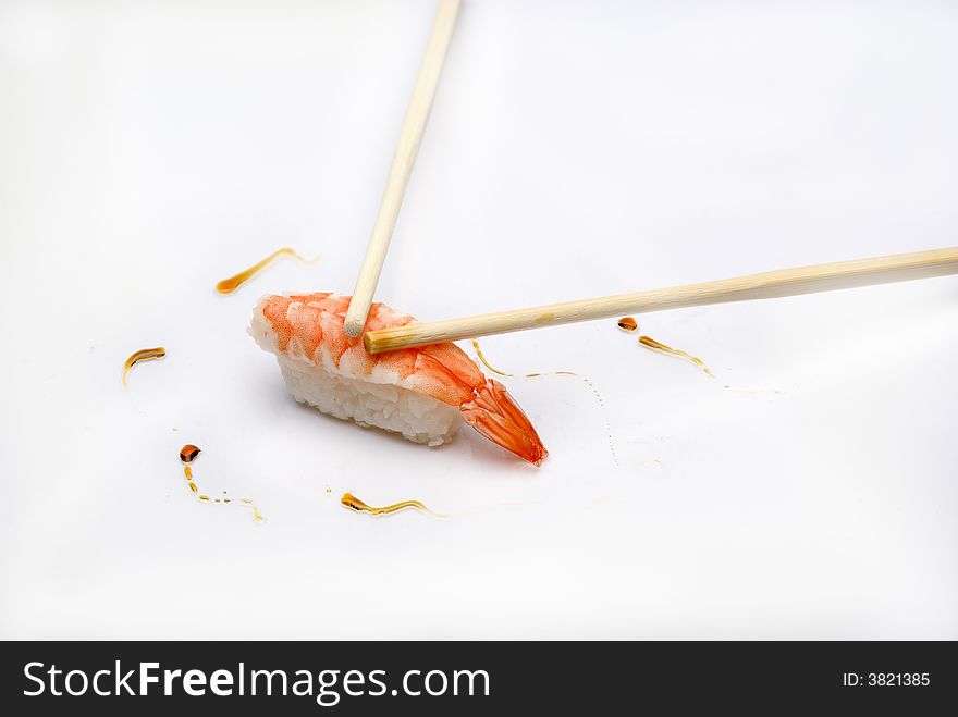 Close up of a shrimp nigiri in a elegant composition