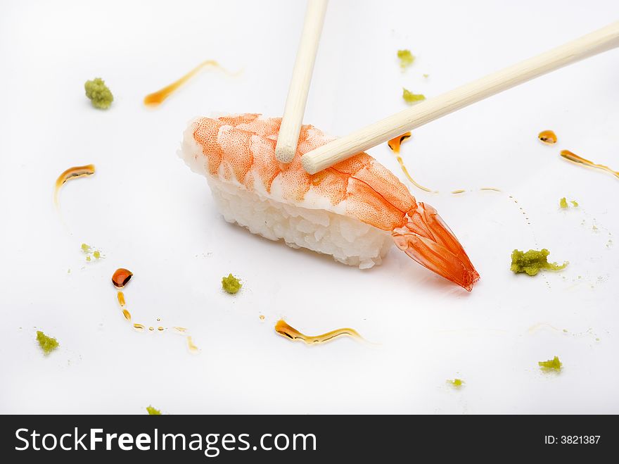 Close up of a shrimp nigiri in a elegant composition