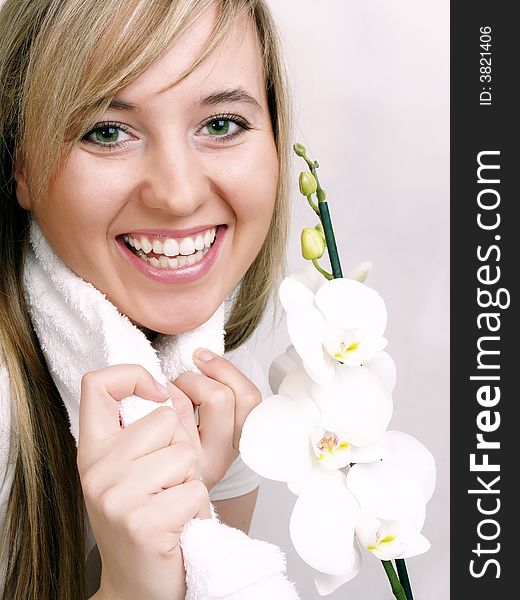 Close up of beautiful woman with white orchid. Close up of beautiful woman with white orchid
