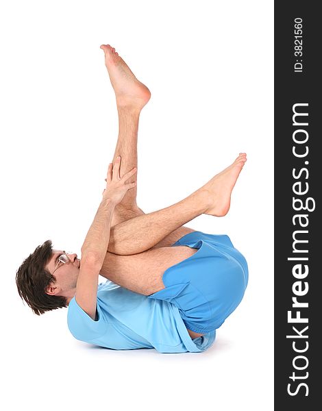 Yoga man with leg up on white