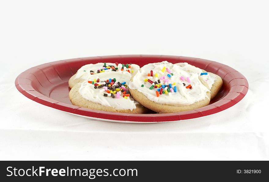 Home made sugar cookies with icing and sprinkles