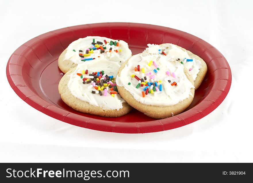 Home made sugar cookies with icing and sprinkles
