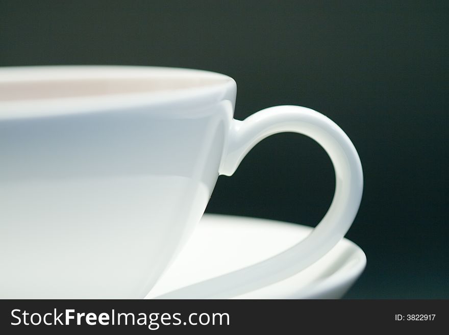 Close-up of a cup of tea on a black background