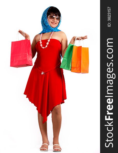 Attractive young woman holding some shopping bags. Attractive young woman holding some shopping bags