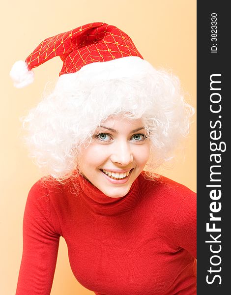 Beautiful young woman wearing santa hat. Beautiful young woman wearing santa hat