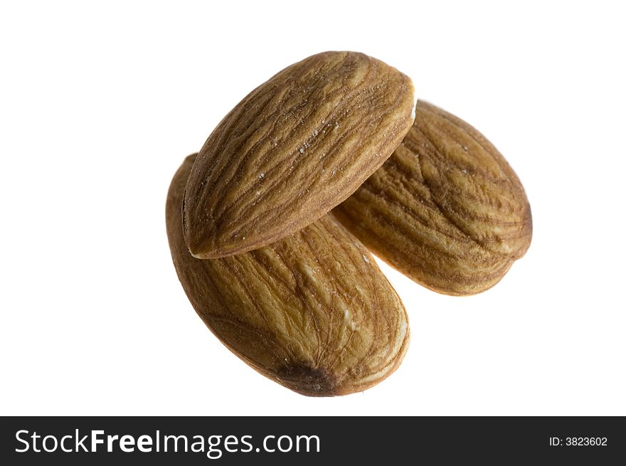 Close-up of almonds on white