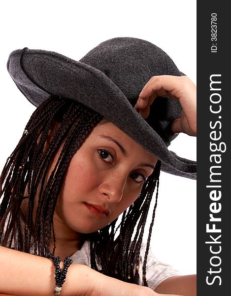 Portrait of a cowgirl over a white background