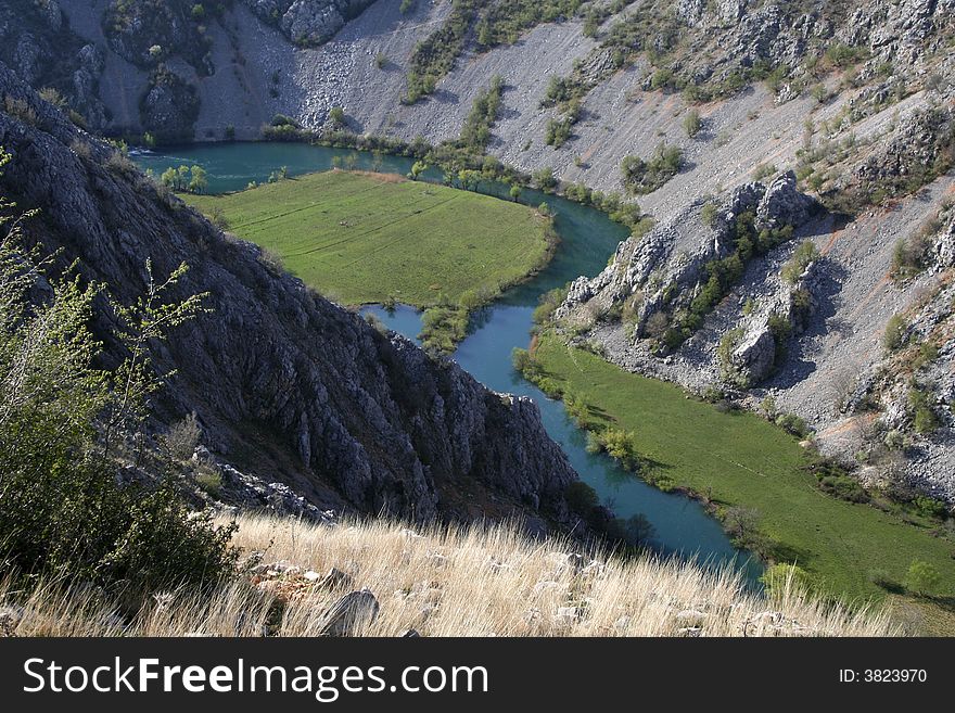 Flowing river in the deep canyon